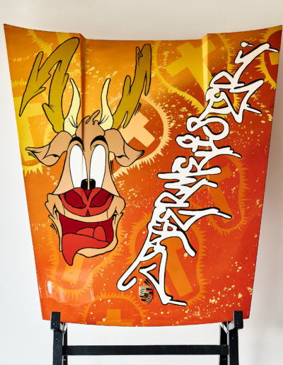 Hood with a cartoon deer painted on it