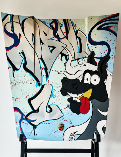 Hood with a cartoon horse painted on it